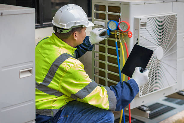 Professional Heat Pump Repair technician working in Long Beach, NY